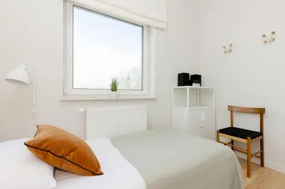 Łóżko lub łóżka w pokoju w obiekcie Warszawa Bright 2-bedroom Apartment by Noclegi Renters