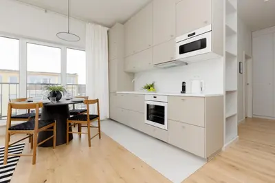 Kuchnia lub aneks kuchenny w obiekcie Warszawa Bright 2-bedroom Apartment by Noclegi Renters