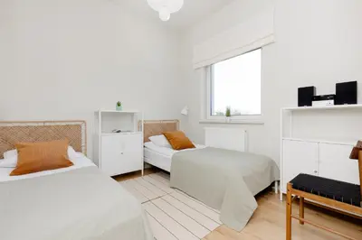 Łóżko lub łóżka w pokoju w obiekcie Warszawa Bright 2-bedroom Apartment by Noclegi Renters