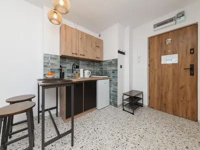 Kuchnia lub aneks kuchenny w obiekcie Metro ONZ apartment/Warsaw central