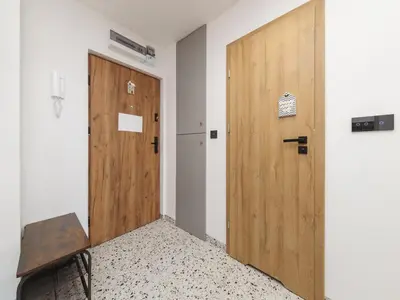 Łóżko lub łóżka w pokoju w obiekcie Metro ONZ apartment/Warsaw central