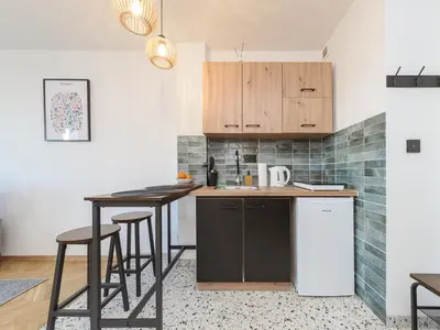 Kuchnia lub aneks kuchenny w obiekcie Metro ONZ apartment/Warsaw central