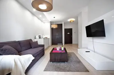 Telewizja i/lub zestaw kina domowego w obiekcie Gieldowa 4D - One bedroom P&O Serviced Apartments