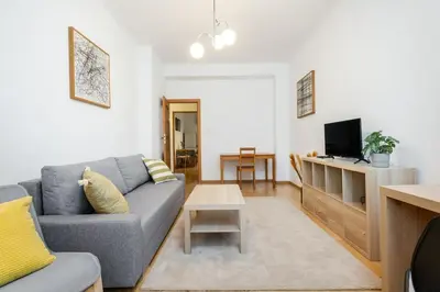 Telewizja i/lub zestaw kina domowego w obiekcie Coriander Apartment City Center