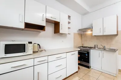 Kuchnia lub aneks kuchenny w obiekcie Coriander Apartment City Center