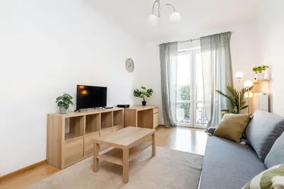 Telewizja i/lub zestaw kina domowego w obiekcie Coriander Apartment City Center