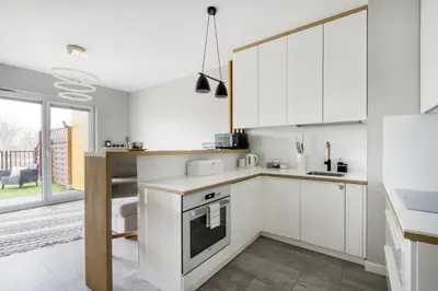 Kuchnia lub aneks kuchenny w obiekcie Gama Home Glebocka 5D, 2-6 Guests