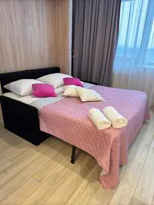 Łóżko lub łóżka w pokoju w obiekcie Zlatarooms 208