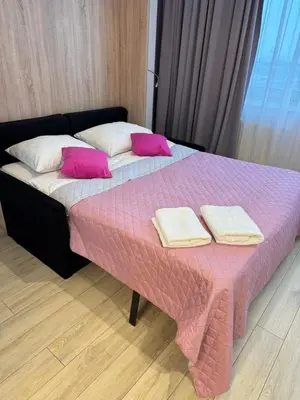 Łóżko lub łóżka w pokoju w obiekcie Zlatarooms 208