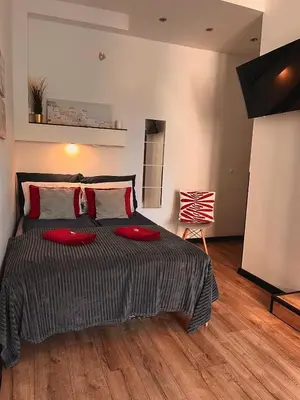 Łóżko lub łóżka w pokoju w obiekcie Final 1room Condo WarszawaCenter