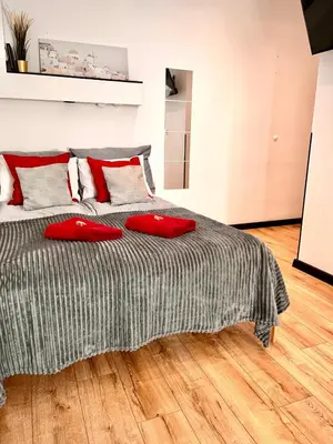 Łóżko lub łóżka w pokoju w obiekcie Final 1room Condo WarszawaCenter