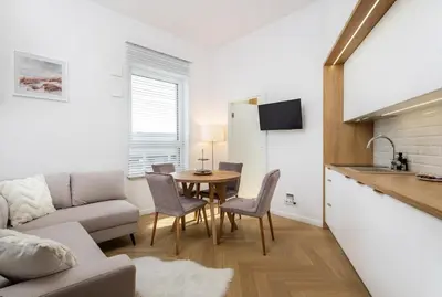 Telewizja i/lub zestaw kina domowego w obiekcie Wiktoryn 18 Citysphere Premium Suite 1