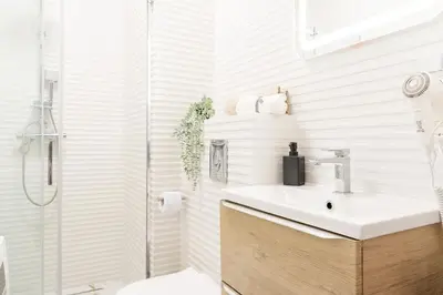 Łazienka w obiekcie Wiktoryn 18 Citysphere Premium Suite 1