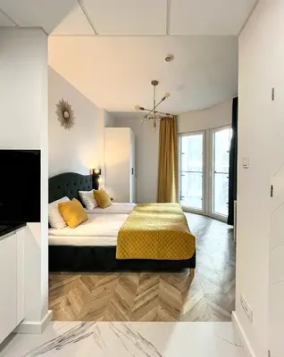 Łóżko lub łóżka w pokoju w obiekcie Warsaw Concierge Tower