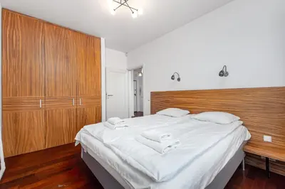 Łóżko lub łóżka w pokoju w obiekcie Skoroszewska 7 by Homeprime
