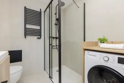 Łazienka w obiekcie Aleja Solidarności Modern & Cozy Apartment Downtown Warsaw by Noclegi Renters