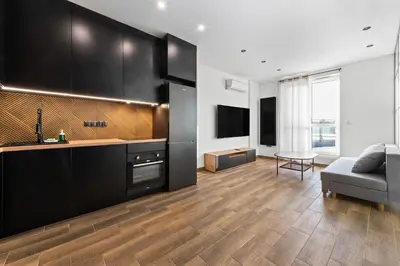Telewizja i/lub zestaw kina domowego w obiekcie RentPlanet - Apartamenty Wiktoryn