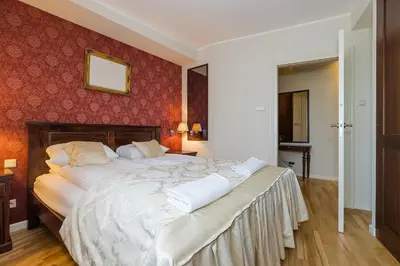Łóżko lub łóżka w pokoju w obiekcie ShortStayPoland Nowy Świat B99