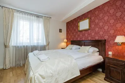 Łóżko lub łóżka w pokoju w obiekcie ShortStayPoland Nowy Świat B99