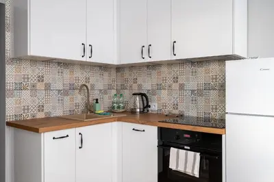Kuchnia lub aneks kuchenny w obiekcie Bemowo Lazurowa Chic Apartment by BookingHost