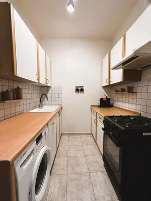 Kuchnia lub aneks kuchenny w obiekcie Plac Zbawiciela by Global Apart