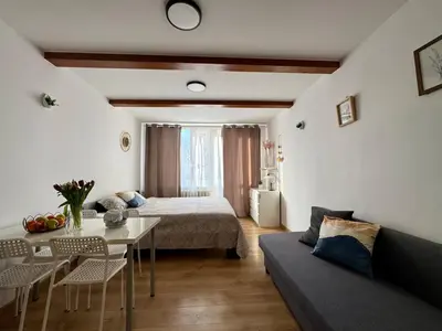 Łóżko lub łóżka w pokoju w obiekcie K22 Al. Niepodległości -Wierzbno