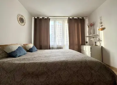 Łóżko lub łóżka w pokoju w obiekcie K22 Al. Niepodległości -Wierzbno