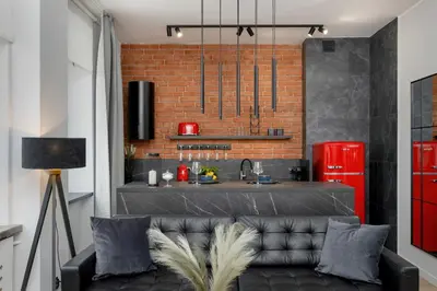 Kuchnia lub aneks kuchenny w obiekcie Exclusive Grey and Red Apartment in Warsaw Center by Noclegi Renters