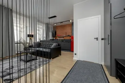 Część wypoczynkowa w obiekcie Exclusive Grey and Red Apartment in Warsaw Center by Noclegi Renters