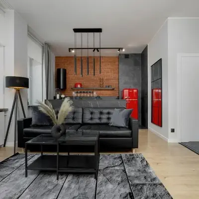 Exclusive Grey and Red Apartment in Warsaw Center by Noclegi Renters