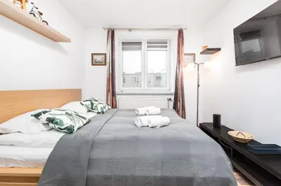 Łóżko lub łóżka w pokoju w obiekcie Brylowska 35 by Homeprime