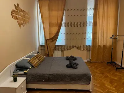Łóżko lub łóżka w pokoju w obiekcie Cozy apartment in the centre of Warsaw