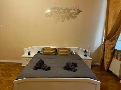 Łóżko lub łóżka w pokoju w obiekcie Cozy apartment in the centre of Warsaw
