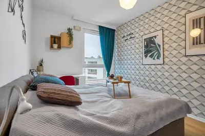 Łóżko lub łóżka w pokoju w obiekcie Warsaw Wola - Parking, Balcony, Quiet & Green Quarter - by Rentujemy