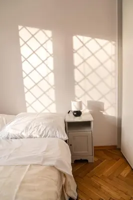 Łóżko lub łóżka w pokoju w obiekcie Apartament Saska 54