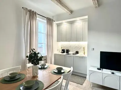 Telewizja i/lub zestaw kina domowego w obiekcie Rynek Nowego Miasta Old Town Apartment
