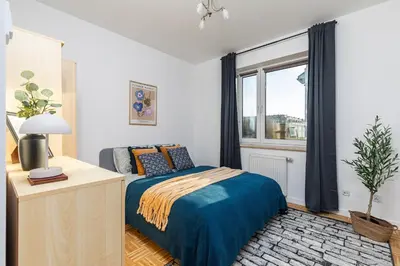 Łóżko lub łóżka w pokoju w obiekcie SuperApart ul Powstańców Śląskich 108c - Studio z wanną