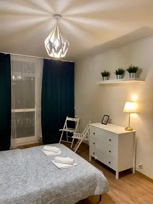 Łóżko lub łóżka w pokoju w obiekcie HALBY rooms Rondo ONZ