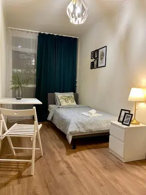 Łóżko lub łóżka w pokoju w obiekcie HALBY rooms Rondo ONZ