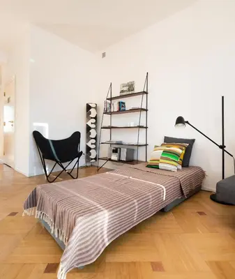 Łóżko lub łóżka w pokoju w obiekcie Solec Powiśle Cosy Apartment by BookingHost