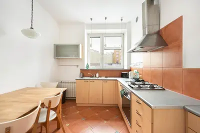 Kuchnia lub aneks kuchenny w obiekcie Solec Powiśle Cosy Apartment by BookingHost