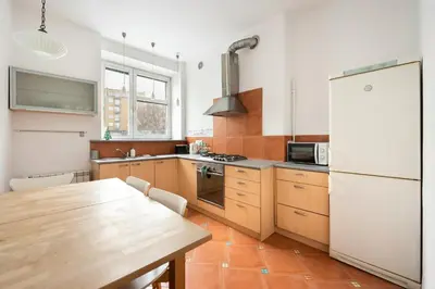 Kuchnia lub aneks kuchenny w obiekcie Solec Powiśle Cosy Apartment by BookingHost