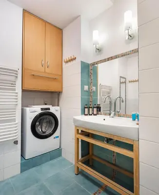 Kuchnia lub aneks kuchenny w obiekcie Solec Powiśle Cosy Apartment by BookingHost