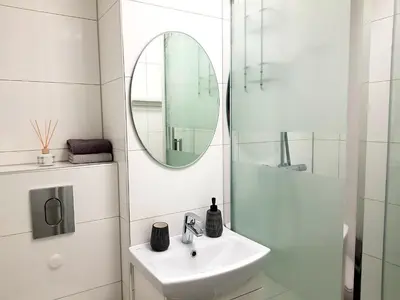 Łazienka w obiekcie Wygodny dwupokojowy apartament pomiedzy lotniskiem a centrum