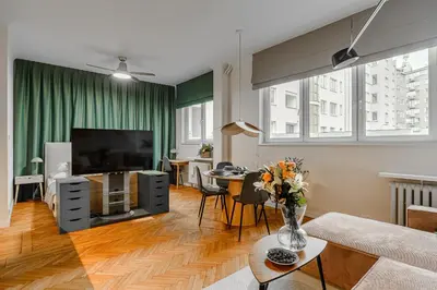 Telewizja i/lub zestaw kina domowego w obiekcie P&O Apartments Wiejska I