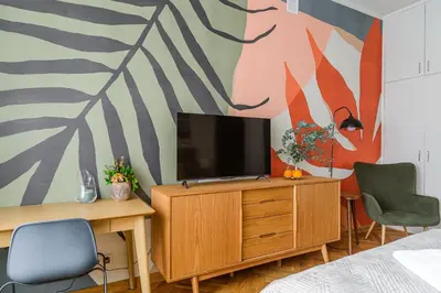 Telewizja i/lub zestaw kina domowego w obiekcie P&O Apartments Wiejska II