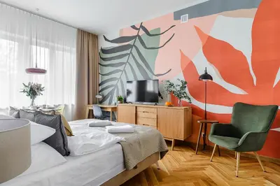 Telewizja i/lub zestaw kina domowego w obiekcie P&O Apartments Wiejska II