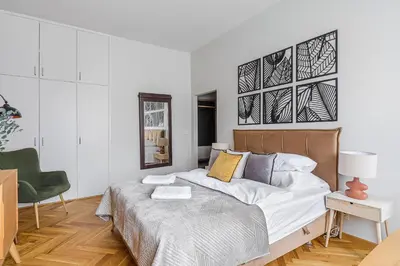 Łóżko lub łóżka w pokoju w obiekcie P&O Apartments Wiejska II