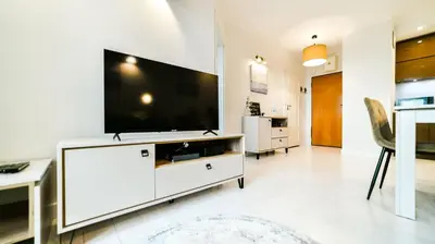Telewizja i/lub zestaw kina domowego w obiekcie Old Town Heart XIII - Wola Radziwie 7