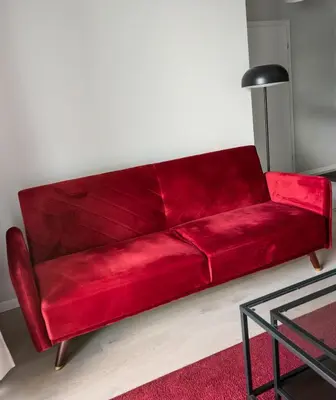 Część wypoczynkowa w obiekcie Białej Floty Red Apartment by BookingHost